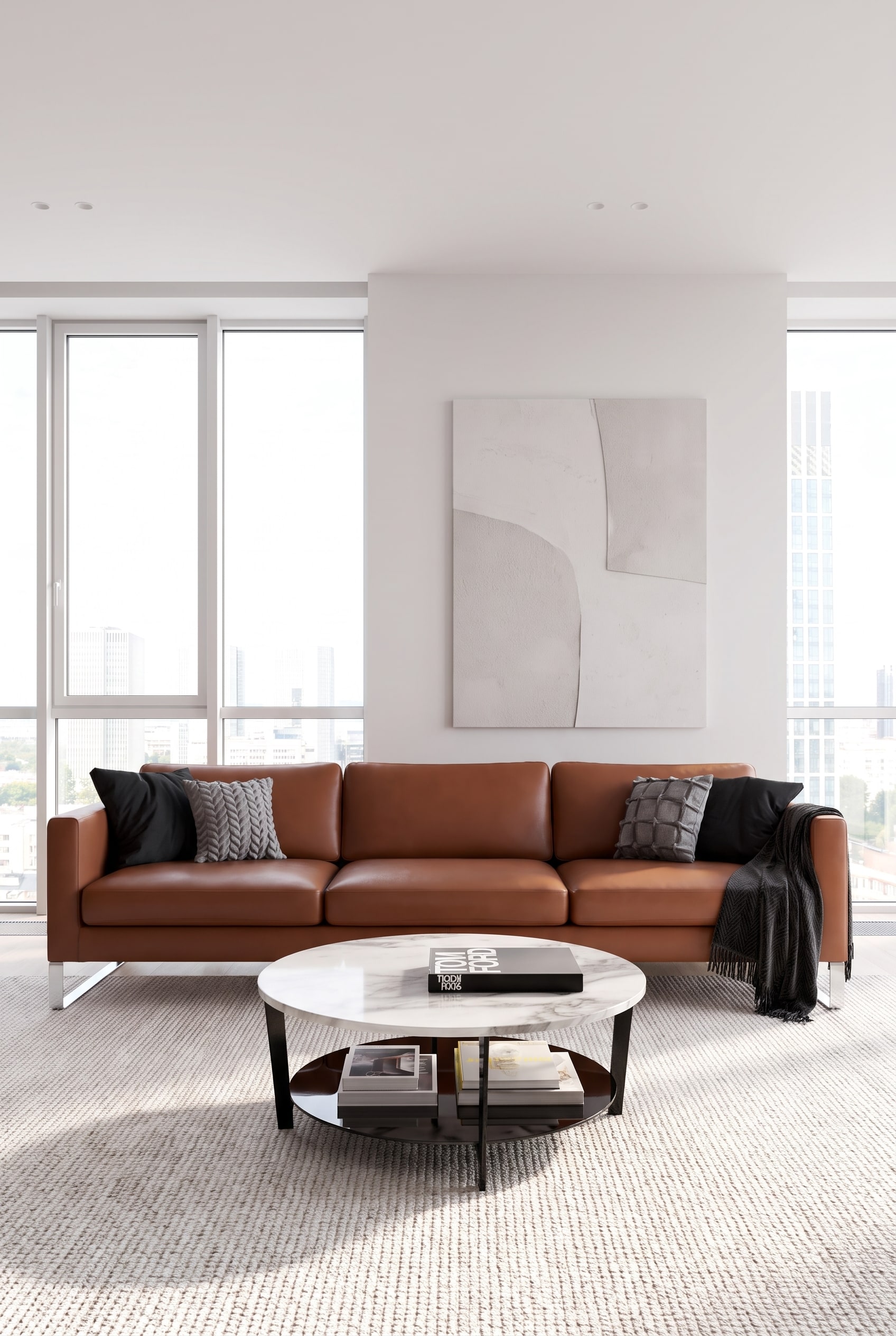 Elegant statement sofa made of black leather positioned freestanding in a modern living room.