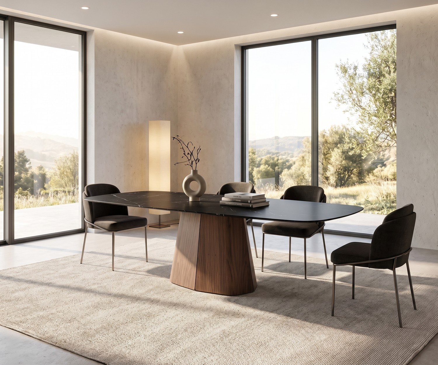 al2 tessera 001 dining table in a dining room, featuring an oval black ceramic top, wood pedestal, and modern chairs