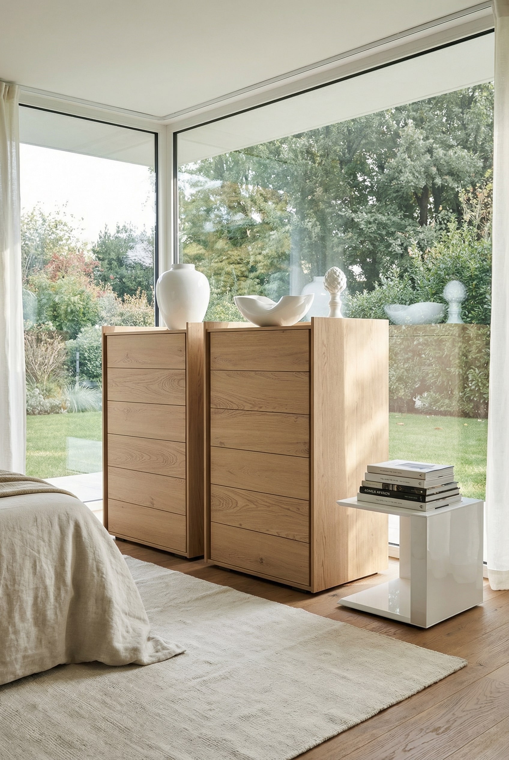 Tall chest of drawers with a material mix of glossy and matte wood surfaces in a cozy room.