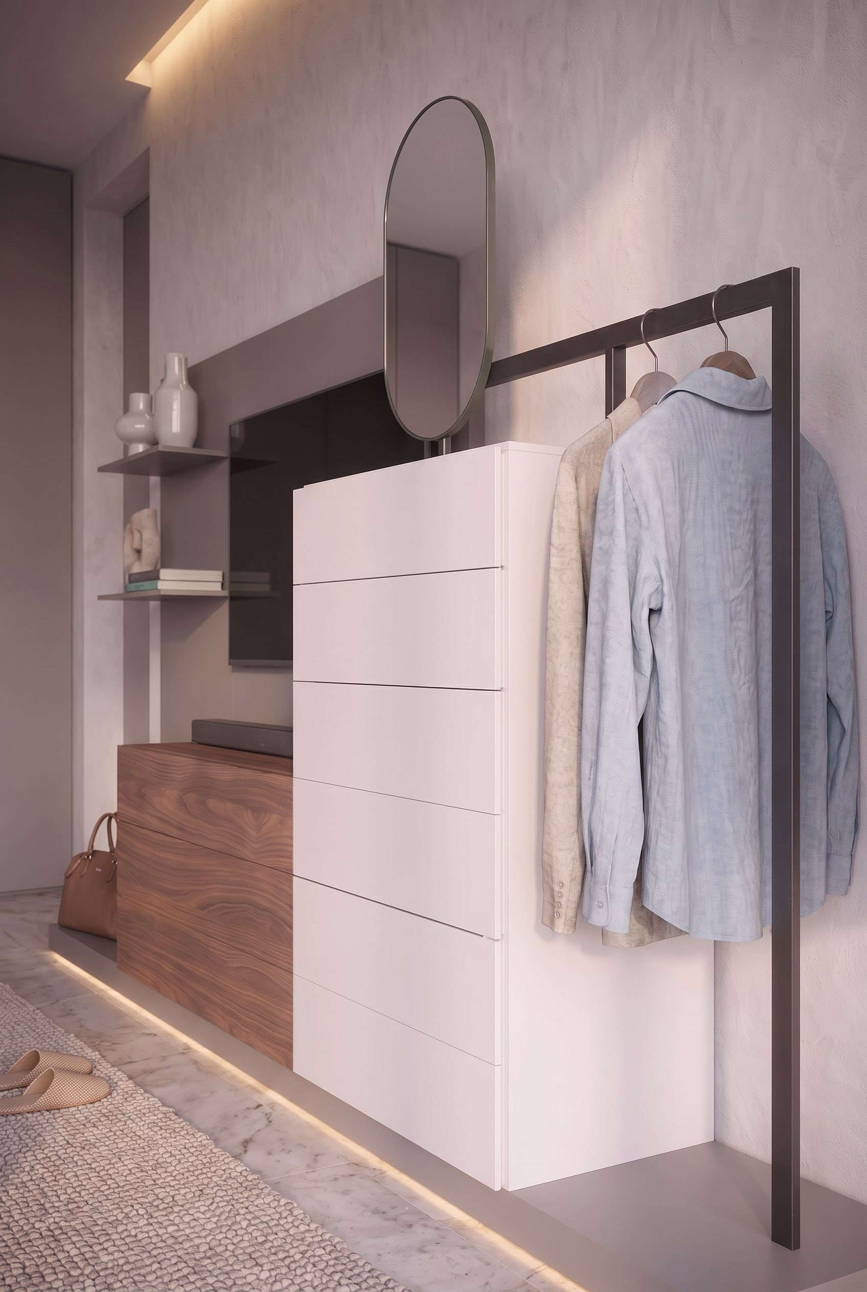 Zijaanzicht van een witte hoge ladekast, omkaderd door een donker metalen frame voor hangende kleding.
