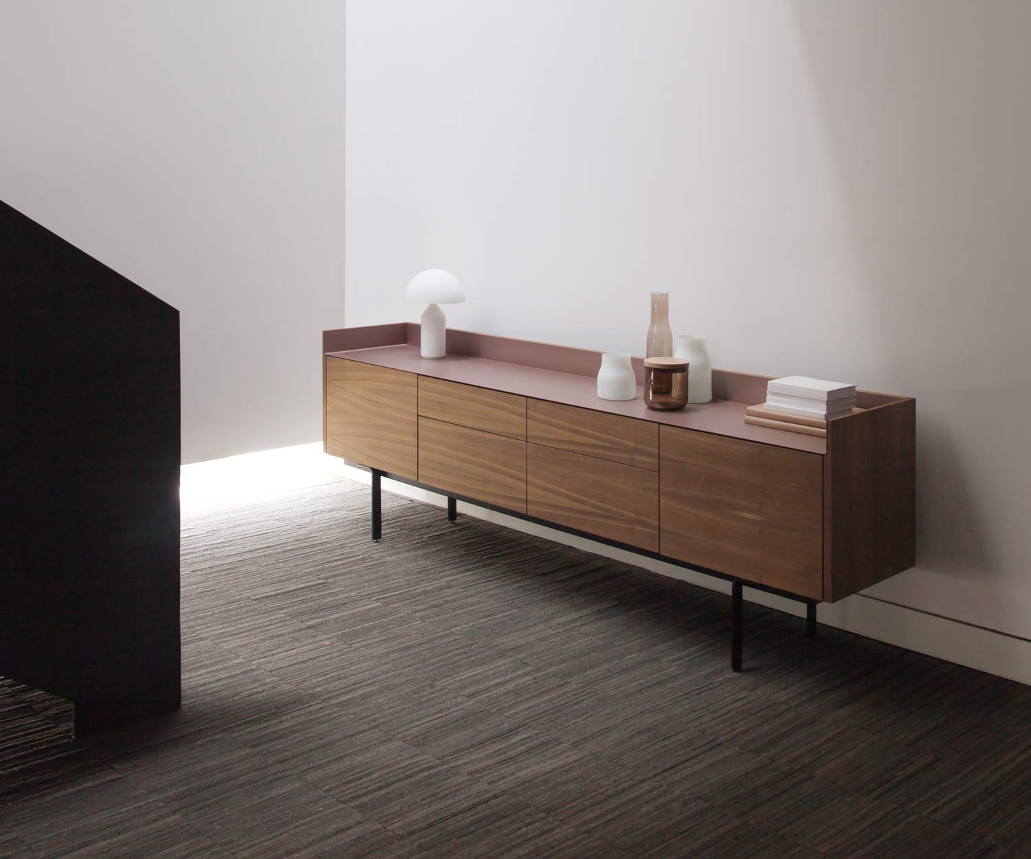 Walnut design sideboard with aluminium top in the dining room