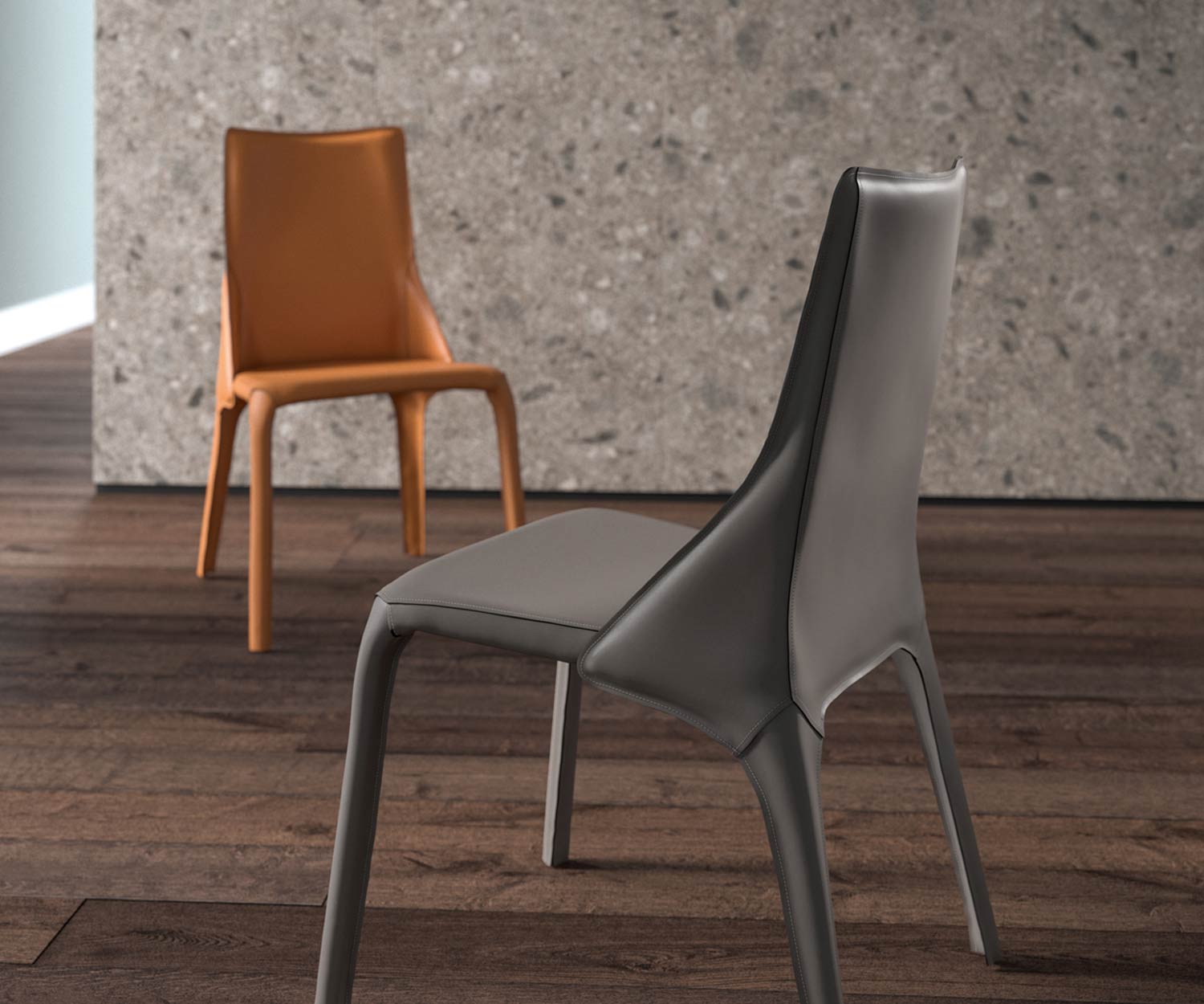 Design Lederstuhl zwei Lederstühle im Detail in den Farben Cognac und Dunkelgrau