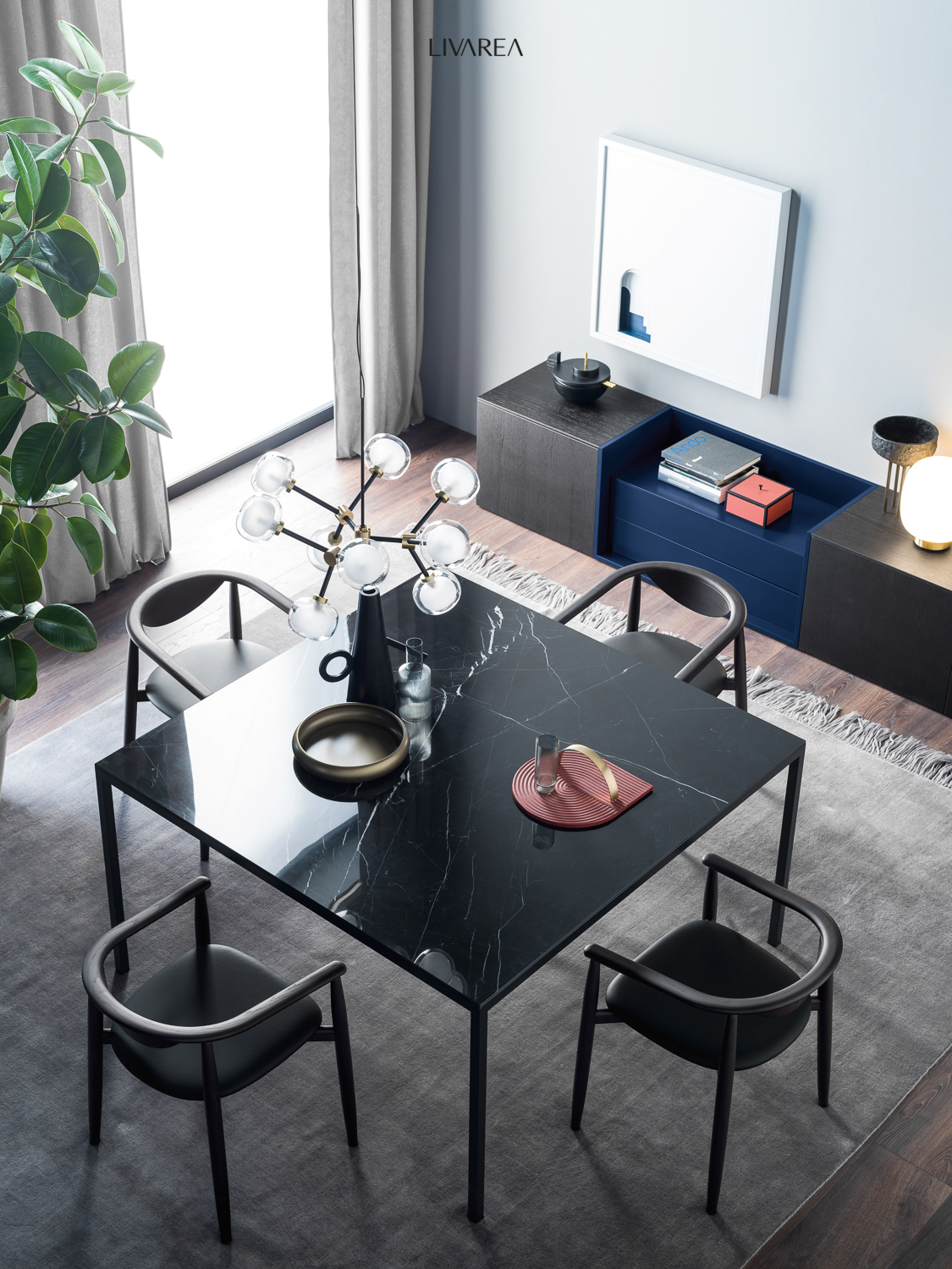 Modernes Designer Esszimmer mit Marmor Esstisch vier Esszimerstuehlen und aussergewoehnlichem Sideboard
