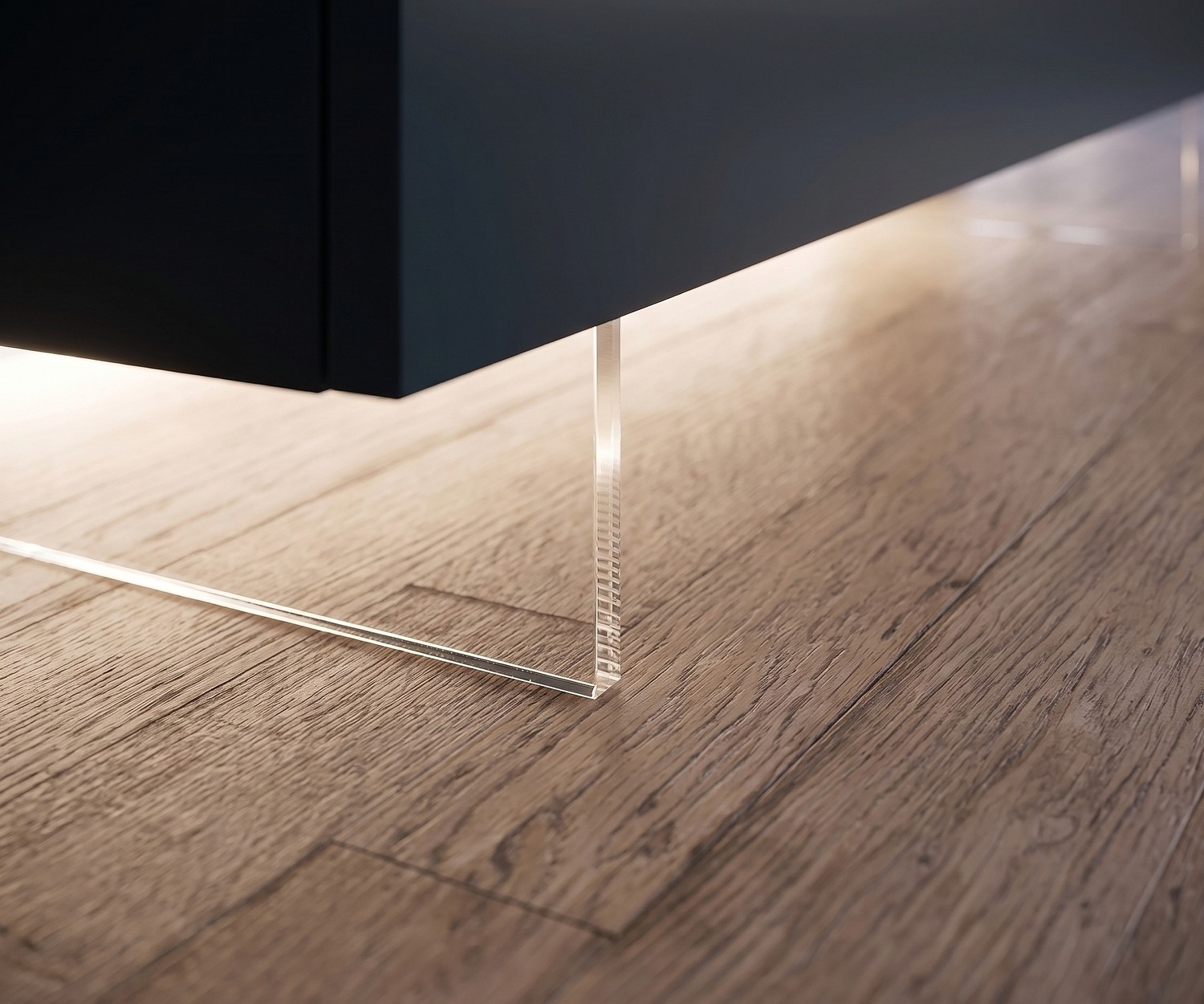 Livitalia Transparent TV Lowboard Plinth Transparent TV lowboard plinth by Livitalia creating a floating effect with LED light on wooden floor.