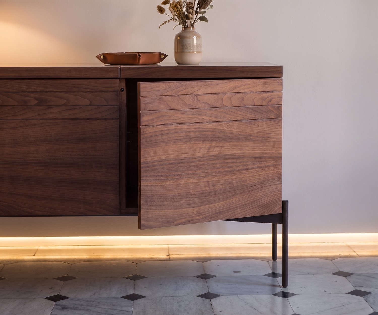 al2 o-rizon 003 Walnut Sideboard al2 o-rizon 003 design sideboard in walnut wood with a partially open door, modern living room style.