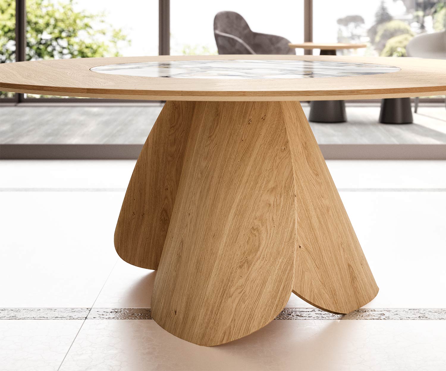 Round dining table in natural oak with swivelling table top Round dining table in natural oak with swivelling table top