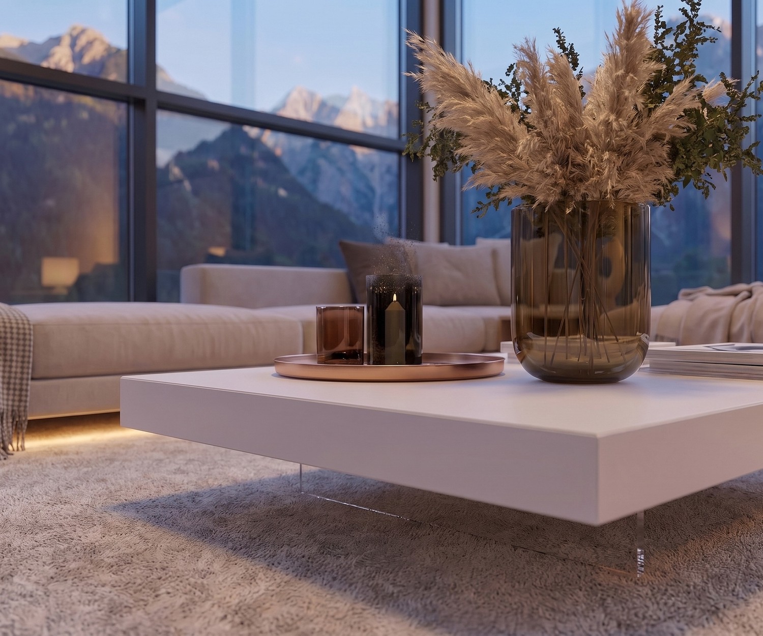 Weißer Livitalia Couchtisch Low auf transparenten Füßen im modernen Wohnzimmer mit Bergpanorama.