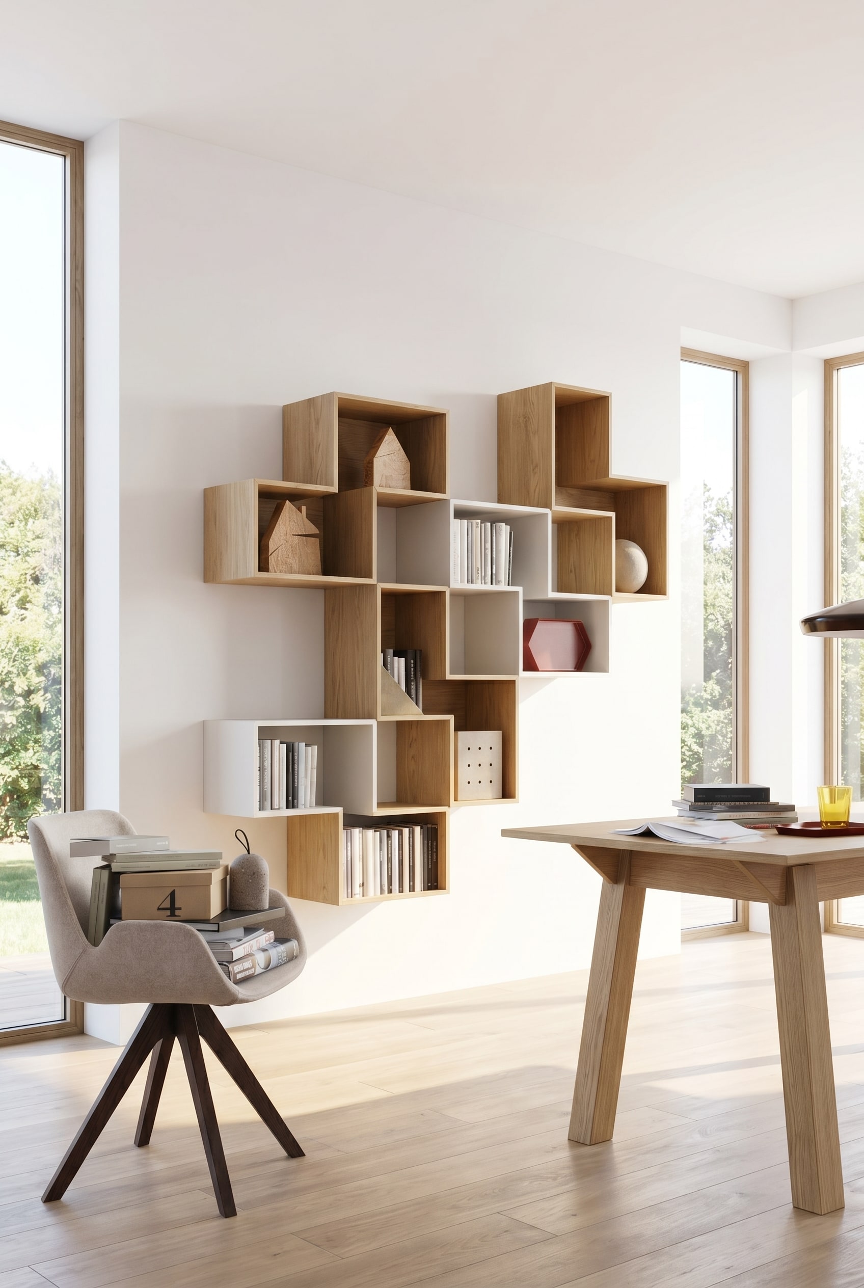 Lichte studeerkamer met een in elkaar grijpende, open Livitalia wandplank Tetris van eikenhout en matlak aan een witte wand