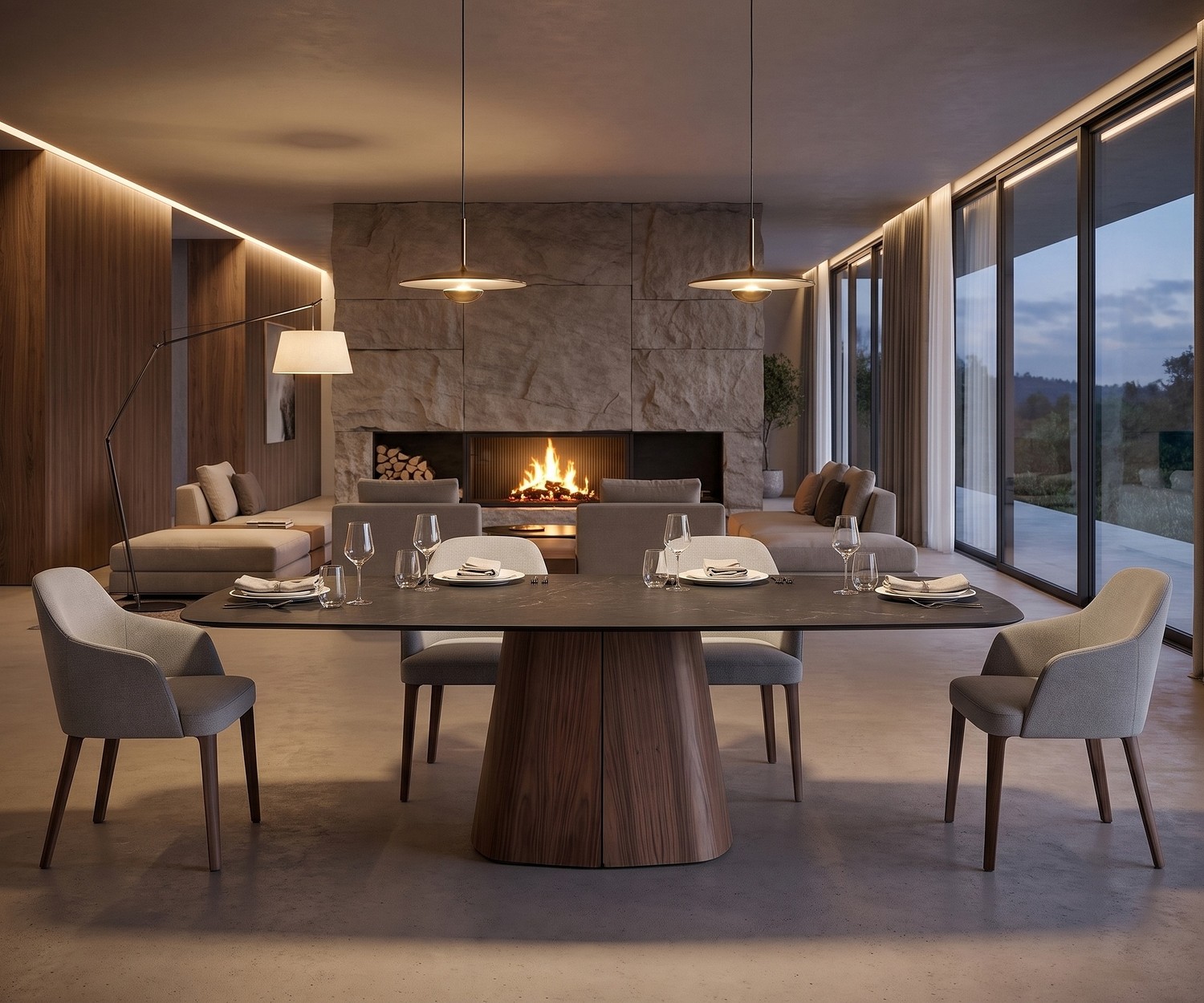 al2 tessera 001 oval dining table with ceramic top and wooden pedestal in a luxury open-plan dining room with a fireplace.