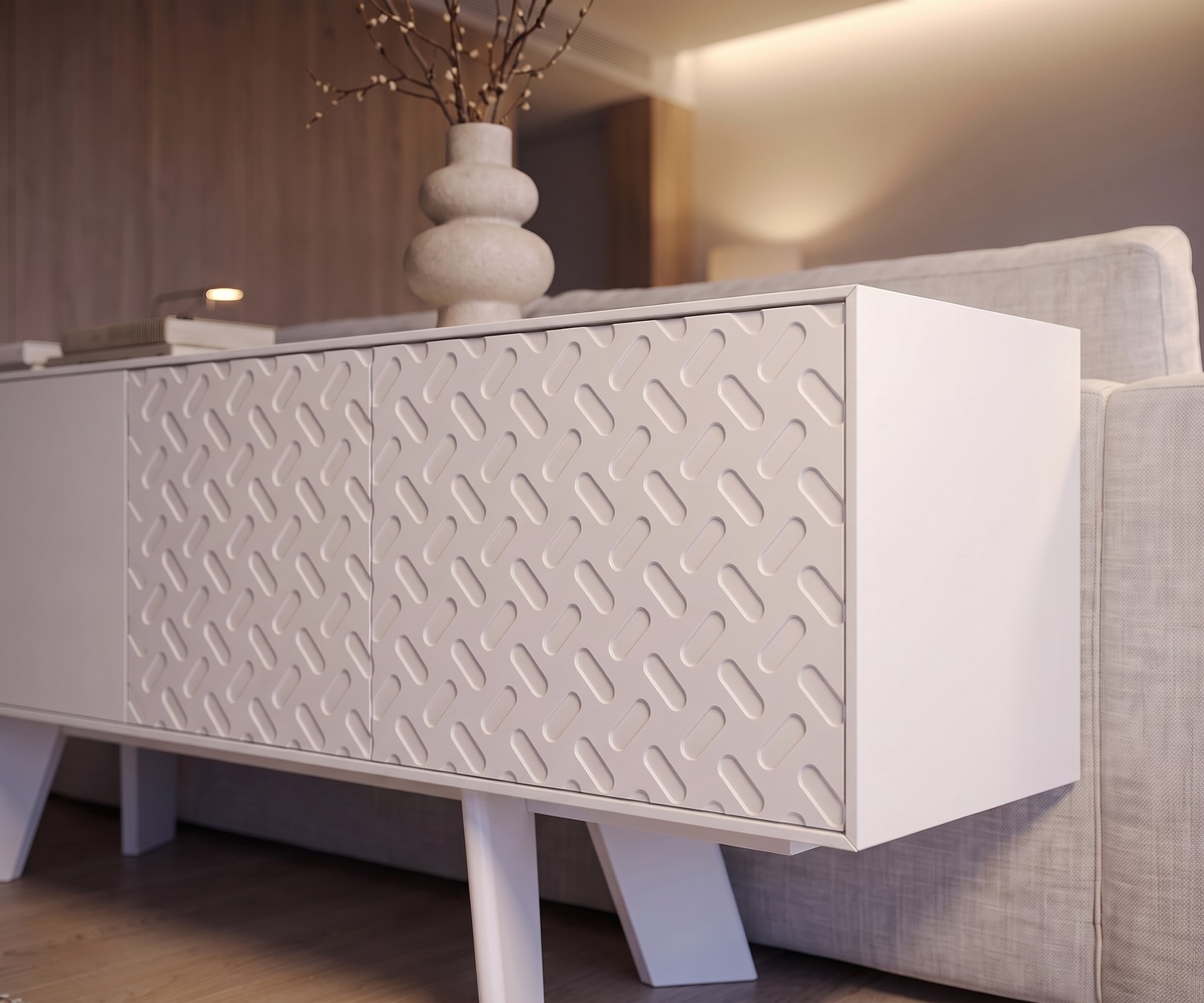 al2 Sideboard Alhambra 003 für das Wohnzimmer mit strukturierter Front in Weiß, modern eingerichtet neben dem Sofa.