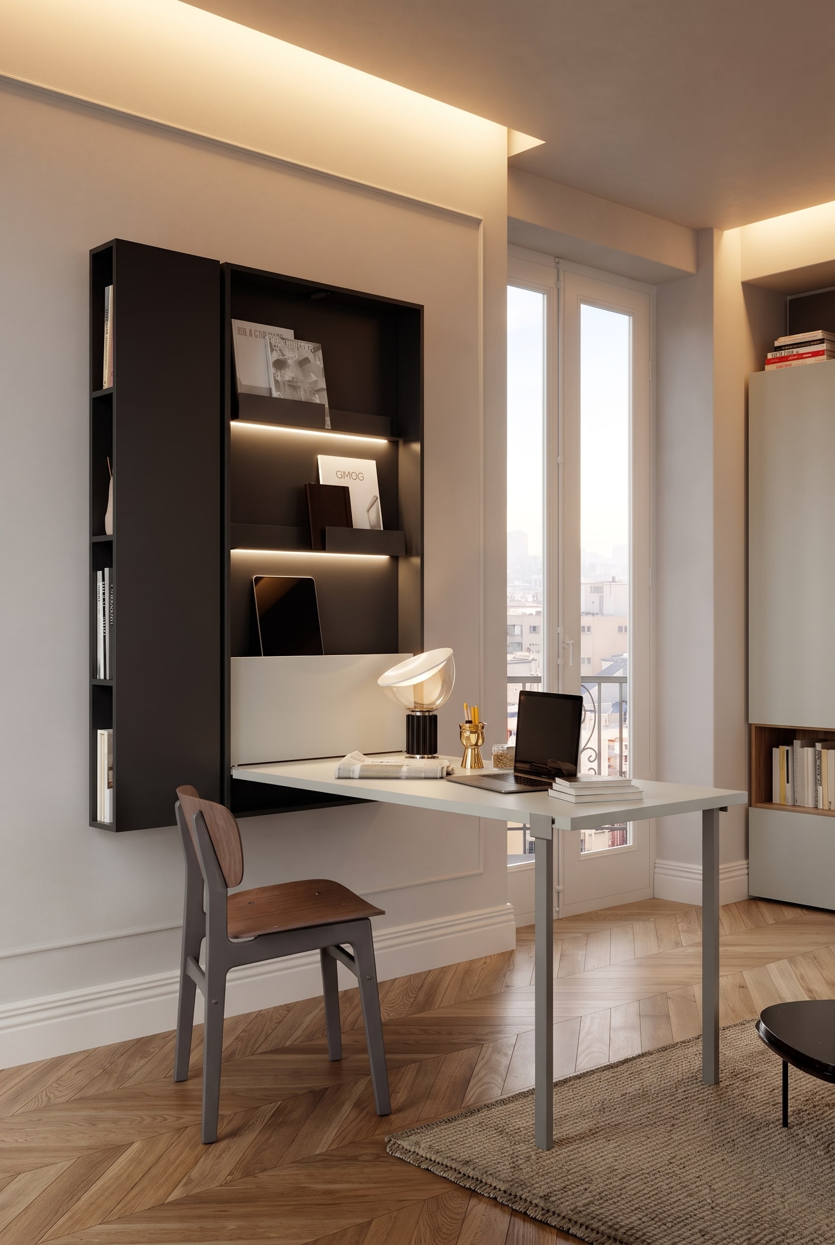 Studio moderno con tavolo pieghevole nero montato a parete e pavimento in legno chiaro