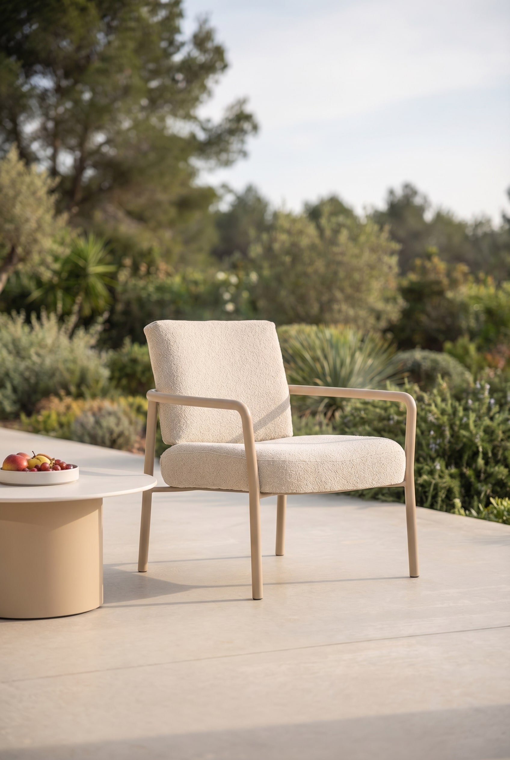 Cozy outdoor lounge armchair with soft bouclé fabric Cozy outdoor lounge armchair with soft bouclé fabric