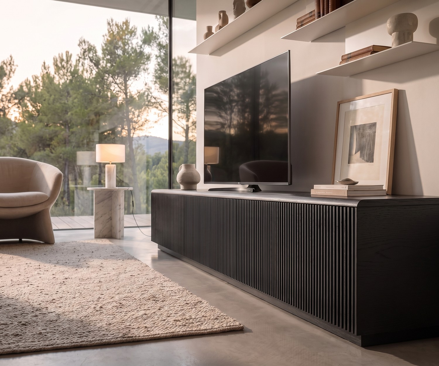 Punt Malmö TV lowboard with dark oak slatted front in a modern living room with floor-to-ceiling windows.