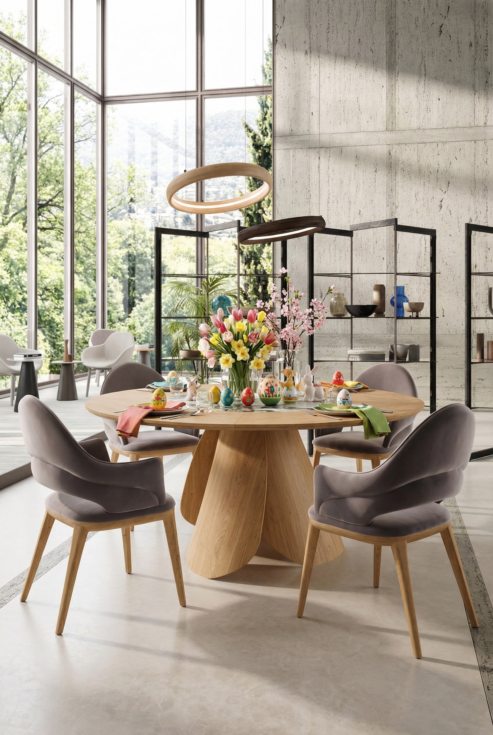 Ozzio Veliero ronde eettafel van licht hout in een lichtdoorstroomde architecten-eetkamer Ozzio Veliero ronde eettafel van licht hout in een lichtdoorstroomde architecten-eetkamer