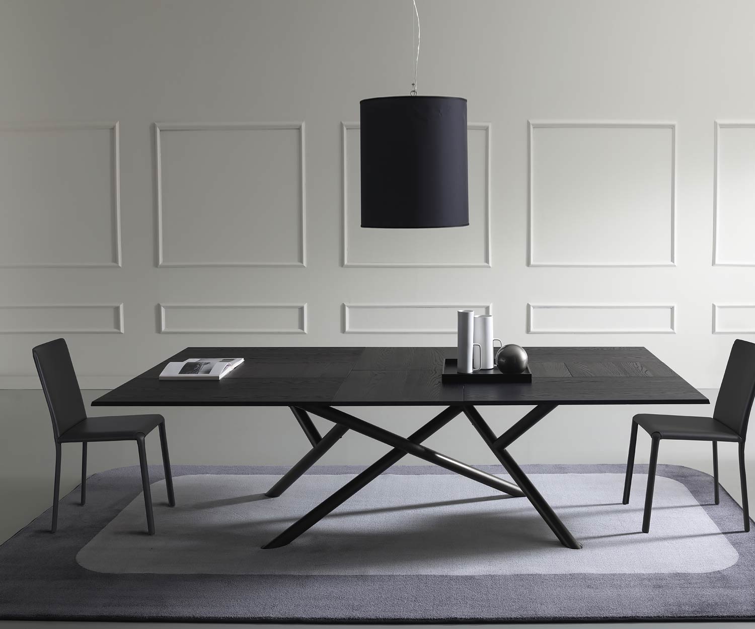 Design dining table Table top black carbon oak veneer grouped in the dining room