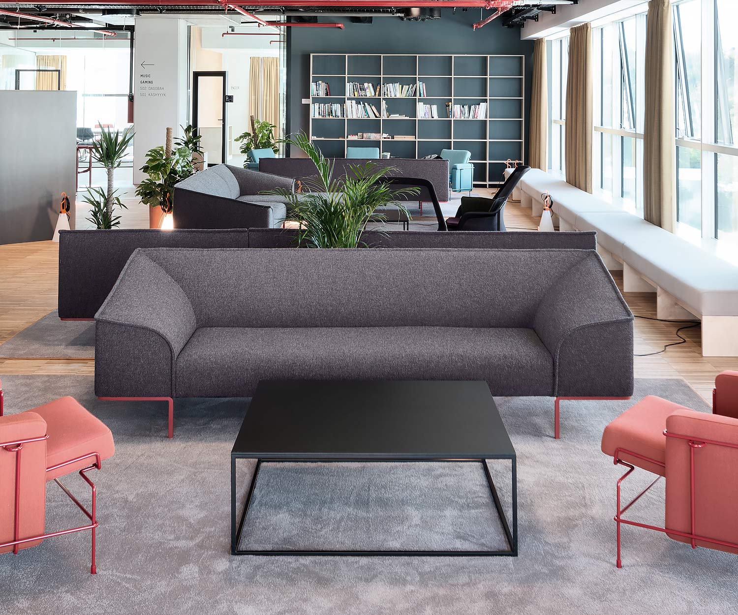 Modern Prostoria designer sofa Seam in dark grey in the waiting room Modern Prostoria designer sofa Seam in dark grey in the waiting room