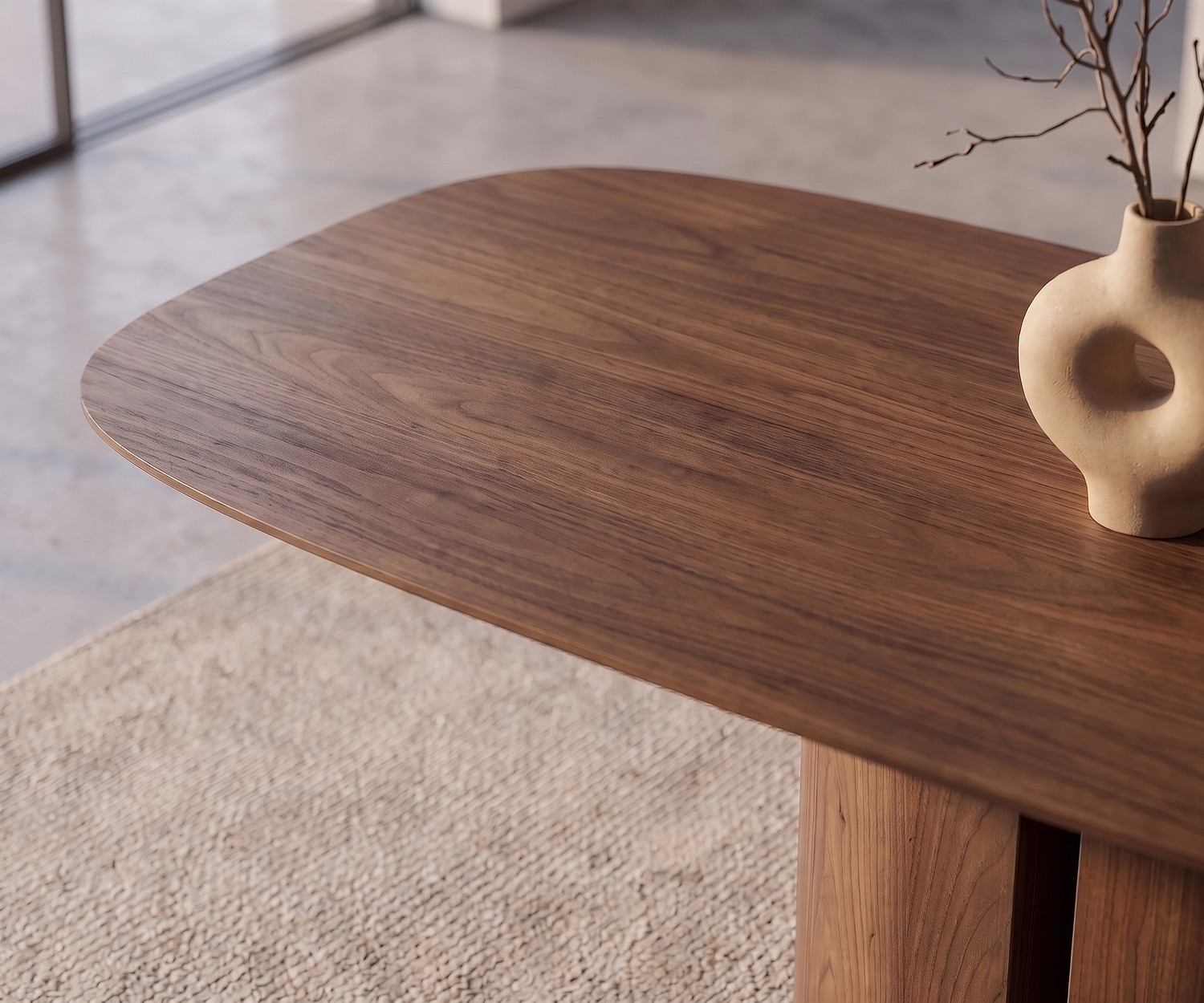 al2 el-it c 001 dining table in elegant wood veneer for modern dining rooms, featuring rounded tabletop and ceramic vase.