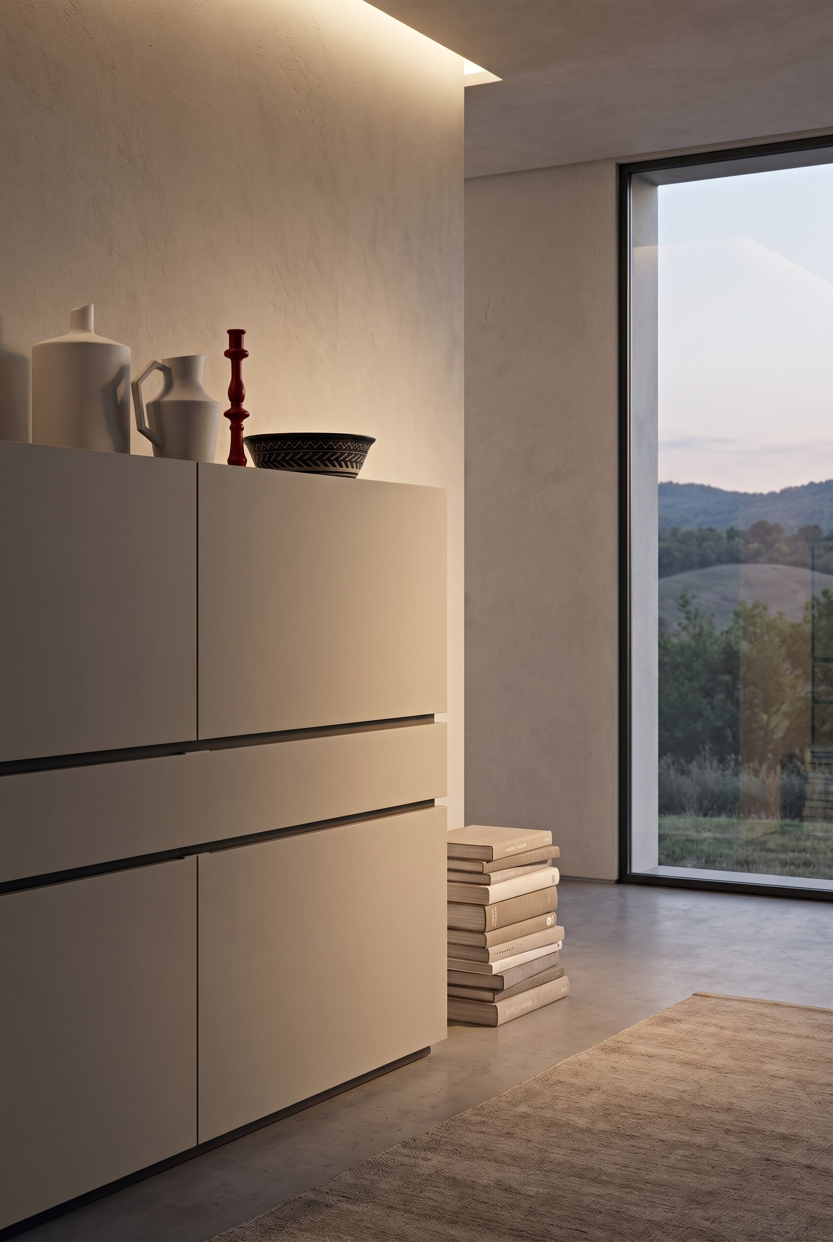 Close-up of a matte Nolea sideboard in greige with soft, diffuse light fall and handleless fronts