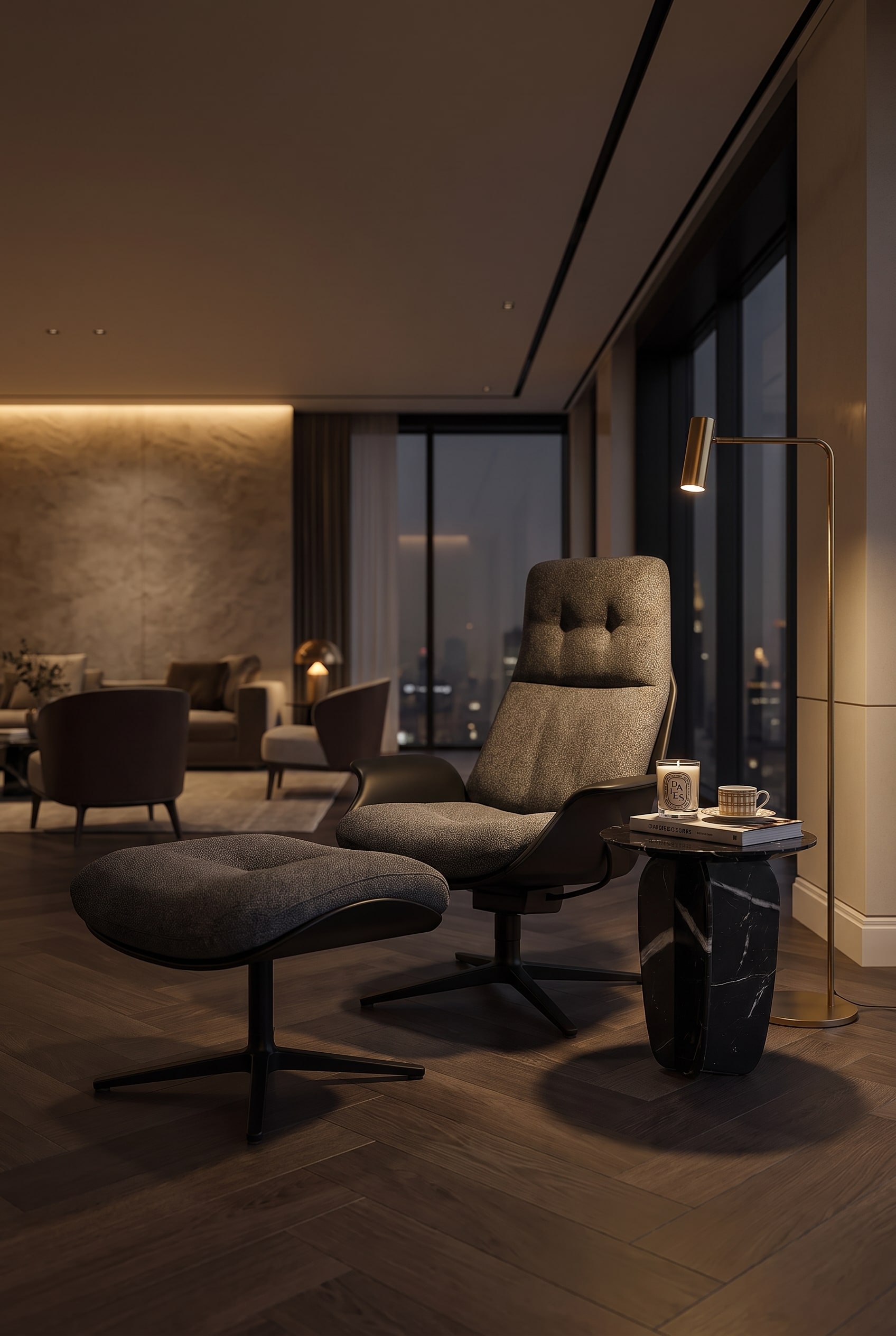 Cozy reading nook in a spacious room with an elegant, dark grey armchair with a high backrest and a delicate floor lamp.