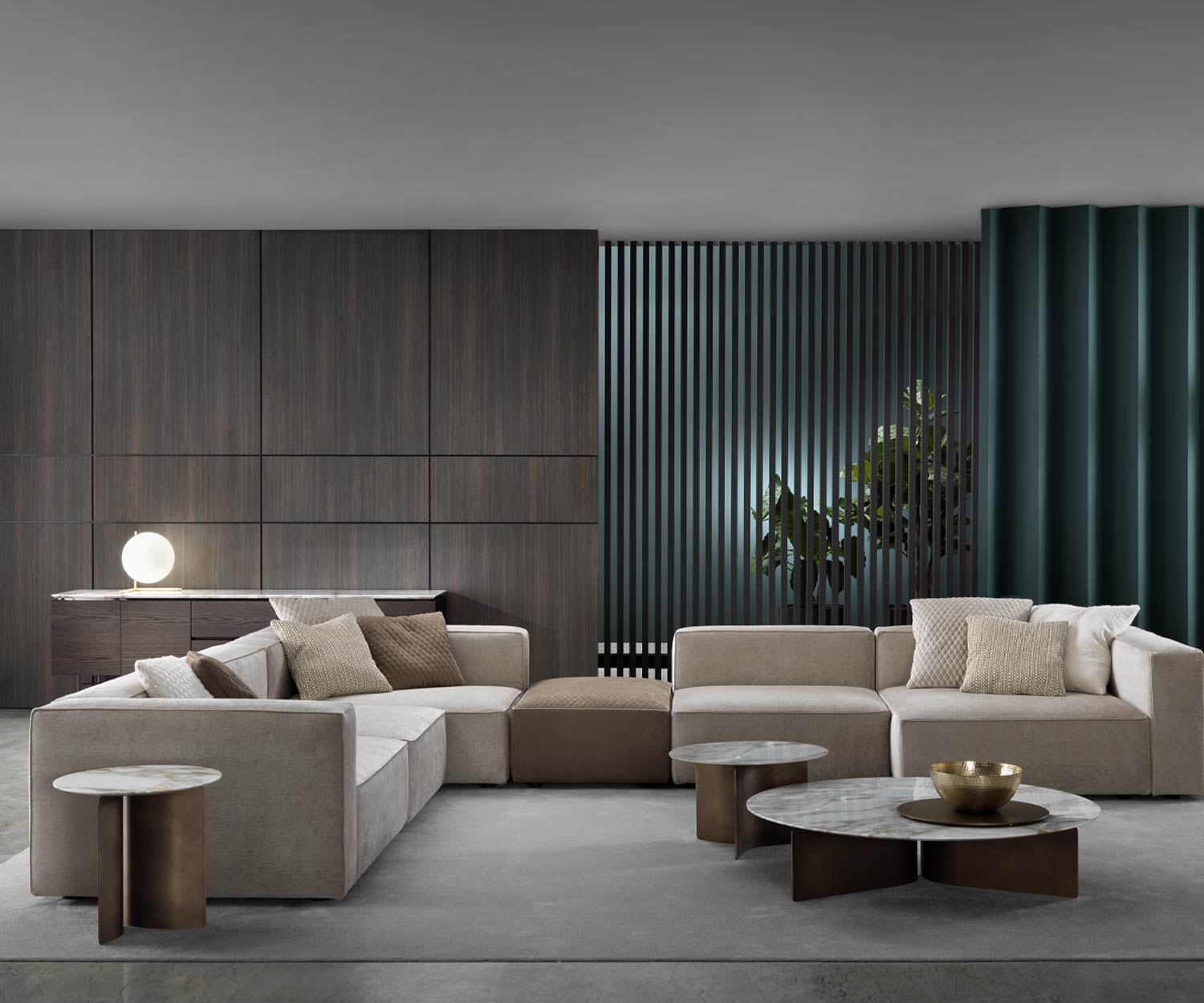 Elegant design coffee table Wave from Marelli in front of an L couch group