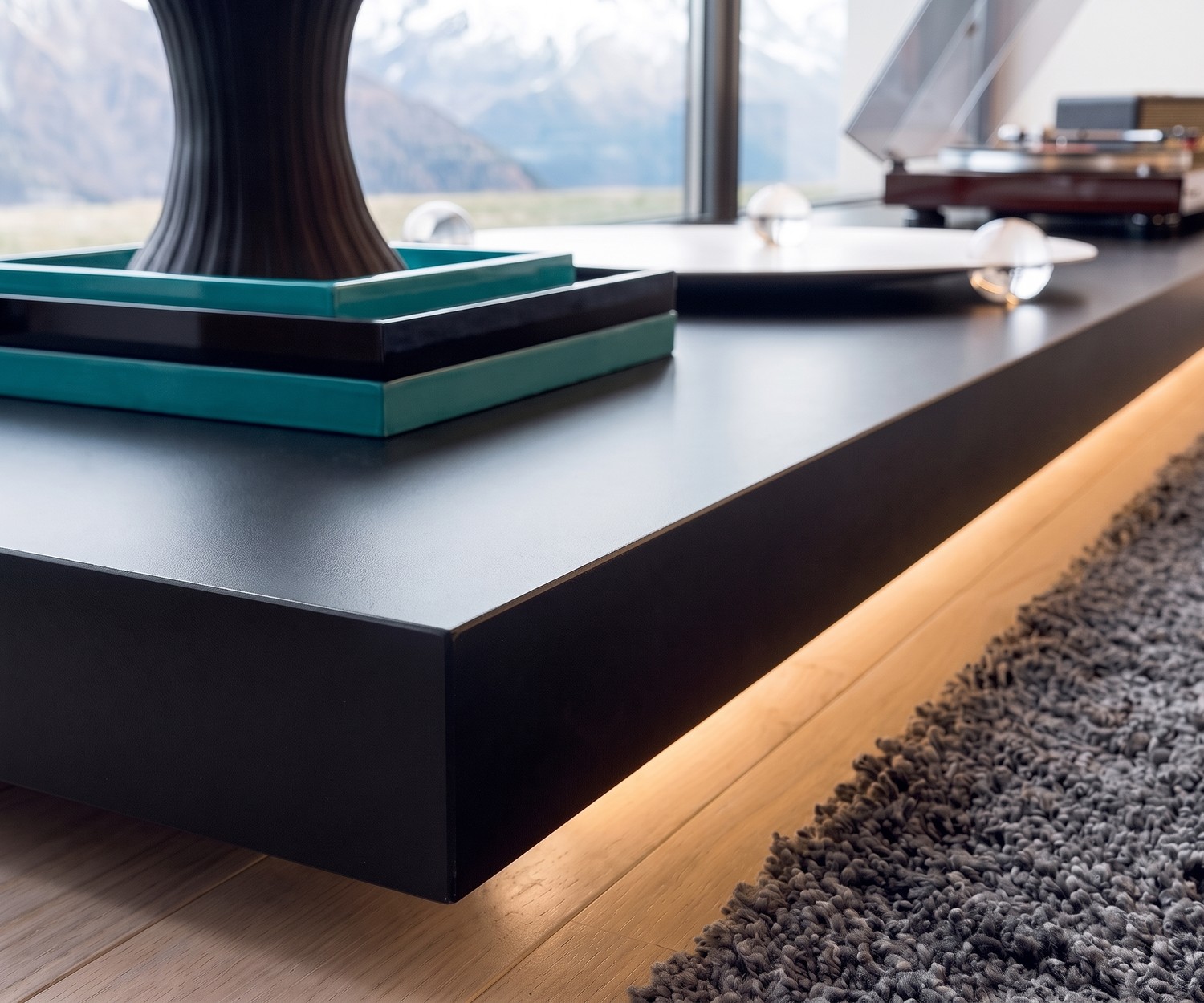 Black Livitalia Easy TV plinth bench with ambient LED lighting for modern living rooms in matte finish.