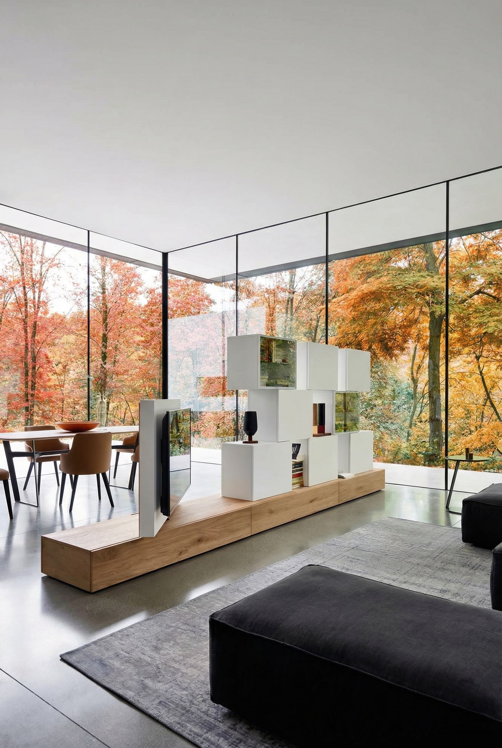 Freistehende Wohnwand als eleganter Raumteiler im offenen Grundriss Freistehende Wohnwand als eleganter Raumteiler im offenen Grundriss