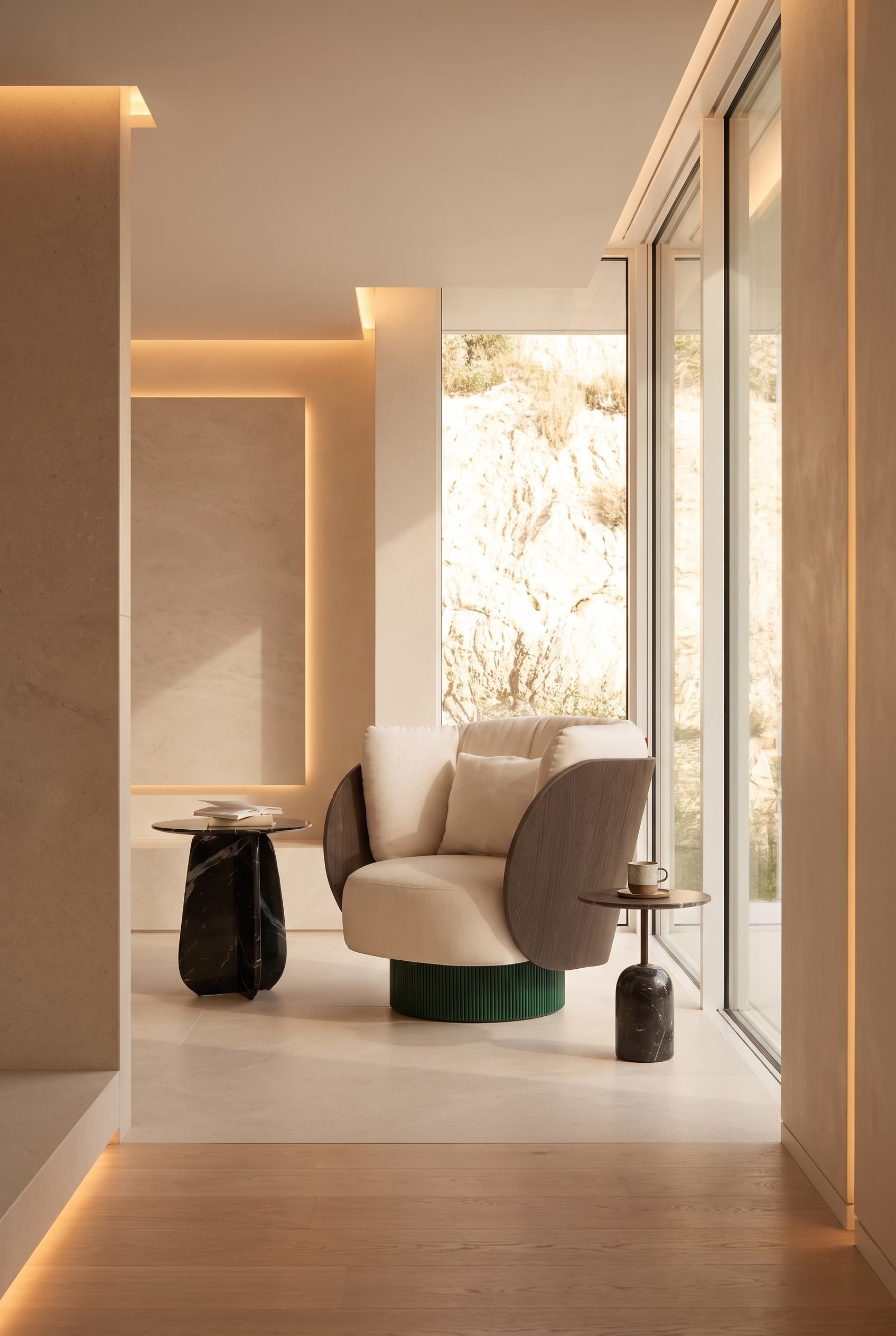 Organically shaped swivel armchair in cream in a linear, monochrome room in front of floor-to-ceiling windows