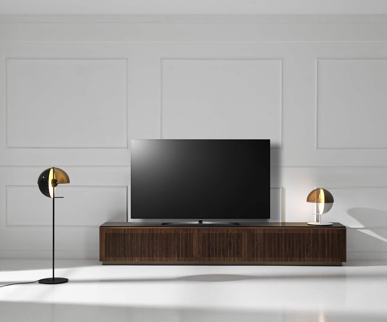 Punt Malmö Design TV design lowboard with TV finished with walnut veneer Punt Malmö Design TV design lowboard with TV finished with walnut veneer