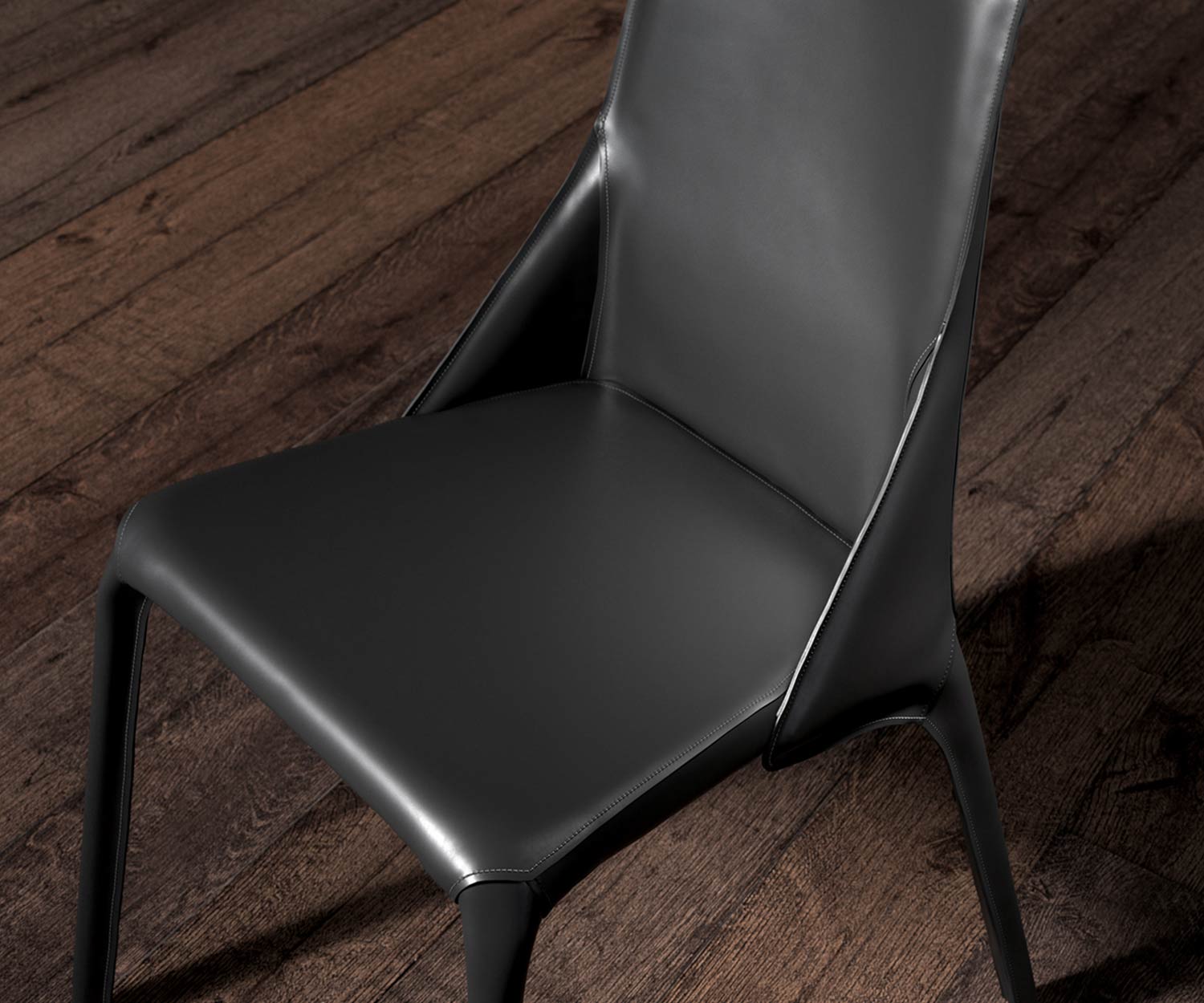 Exquisiter Design Lederstuhl Detail in Schwarz mit Blick auf das Leder