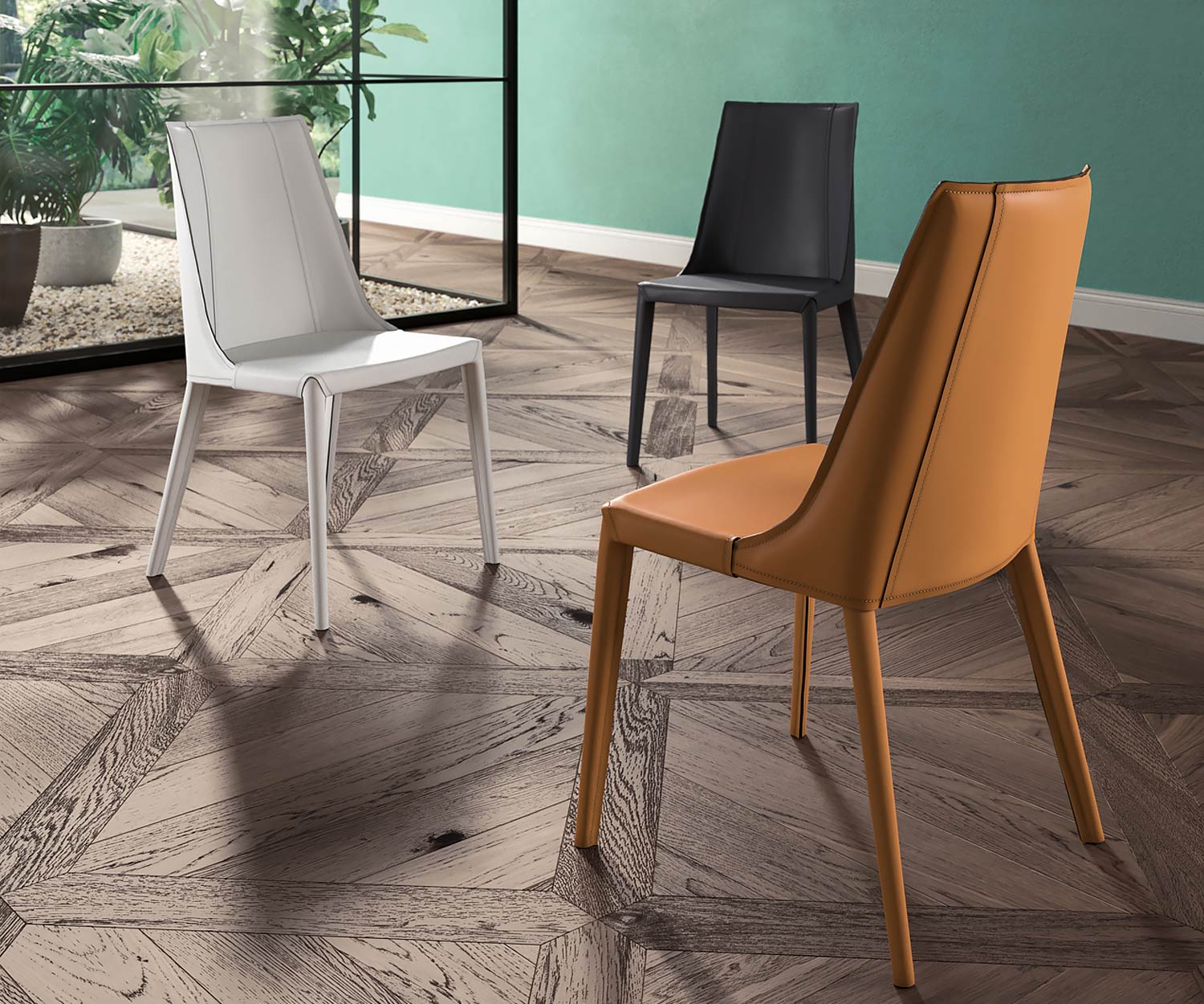 Hochwertiger Design Lederstuhl in den Farben Dunkelgrau Weiß oder Kognac Hochwertiger Design Lederstuhl in den Farben Dunkelgrau Weiß oder Kognac