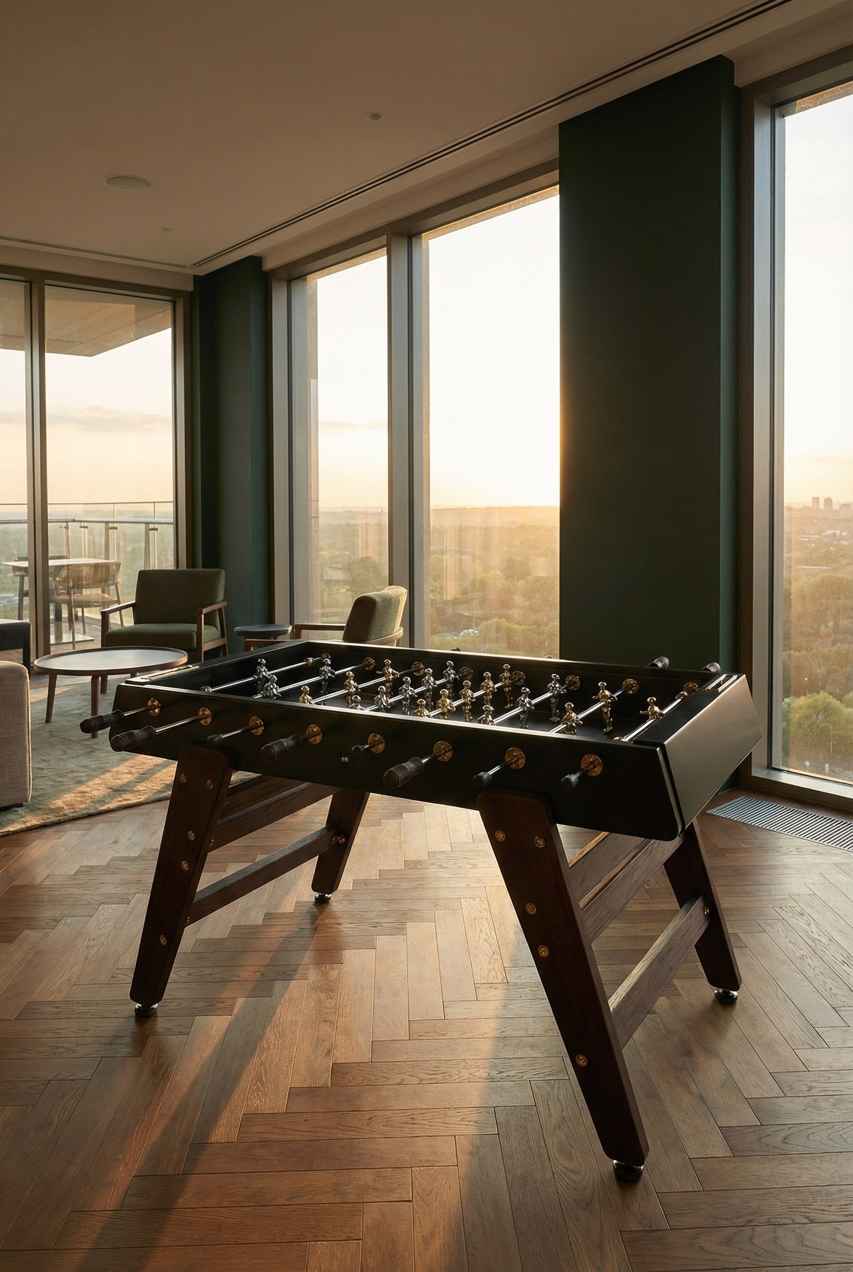 Luxurious foosball table with gold accents in an elegant lounge with deep blue walls and soft evening light. Luxurious foosball table with gold accents in an elegant lounge with deep blue walls and soft evening light.