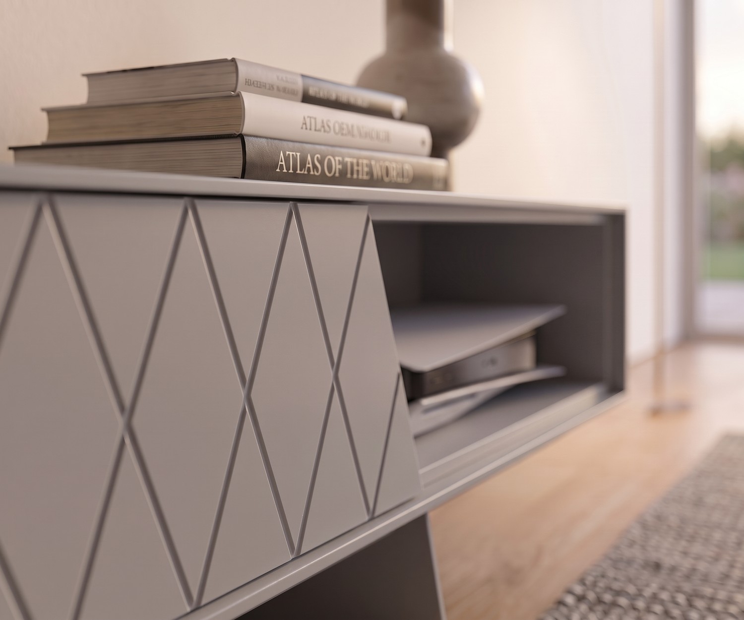al2 e-klipse 008 TV Lowboard mit Rautenmuster TV Lowboard e-klipse 008 von al2 im Wohnzimmer. Modernes graues Design-TV-Möbel mit Rautenmuster, Büchern und Spielekonsole.