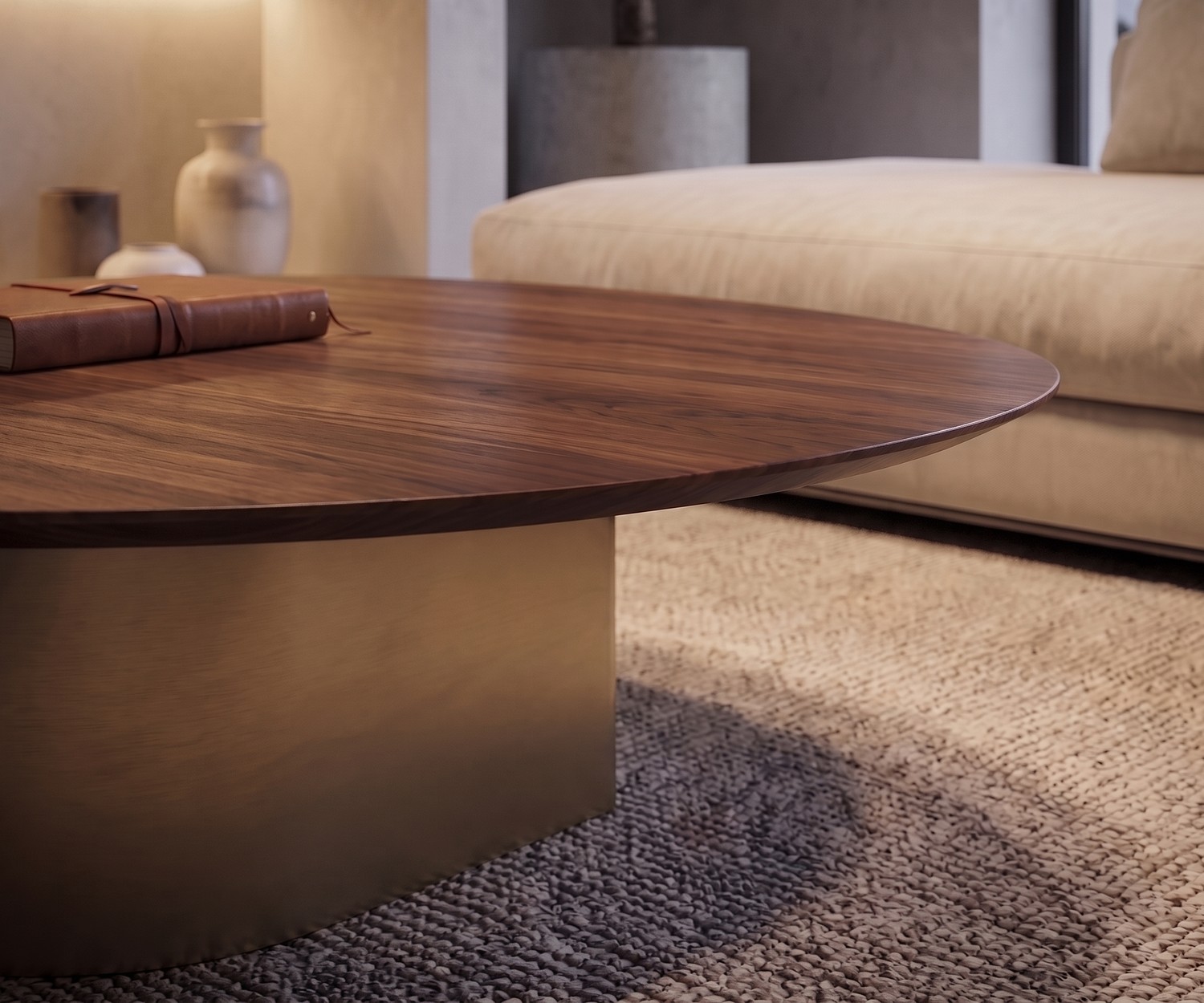 al2 dakry 006 coffee table in a living room with a dark wood veneer top and brushed gold base on a textured rug.