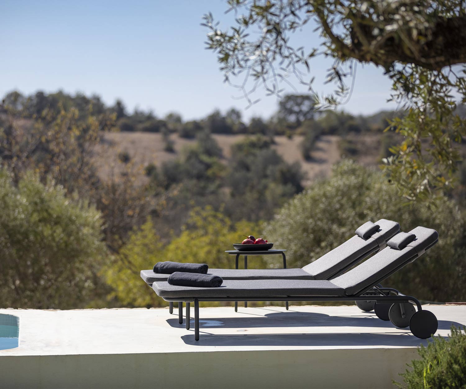 High-quality Todus Starling designer sun lounger with optional head cushion in white High-quality Todus Starling designer sun lounger with optional head cushion in white