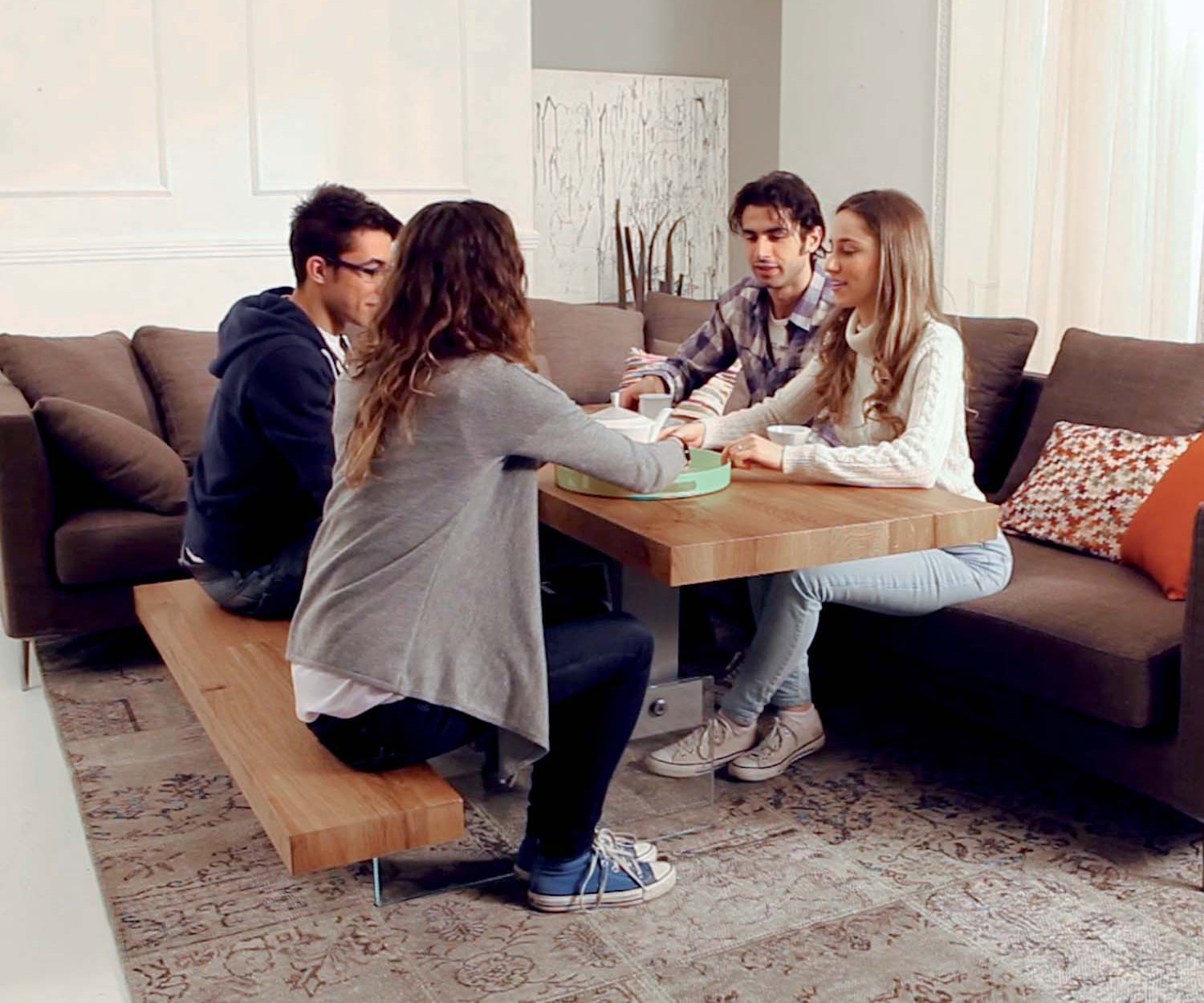 Height-adjustable coffee table with bench seat