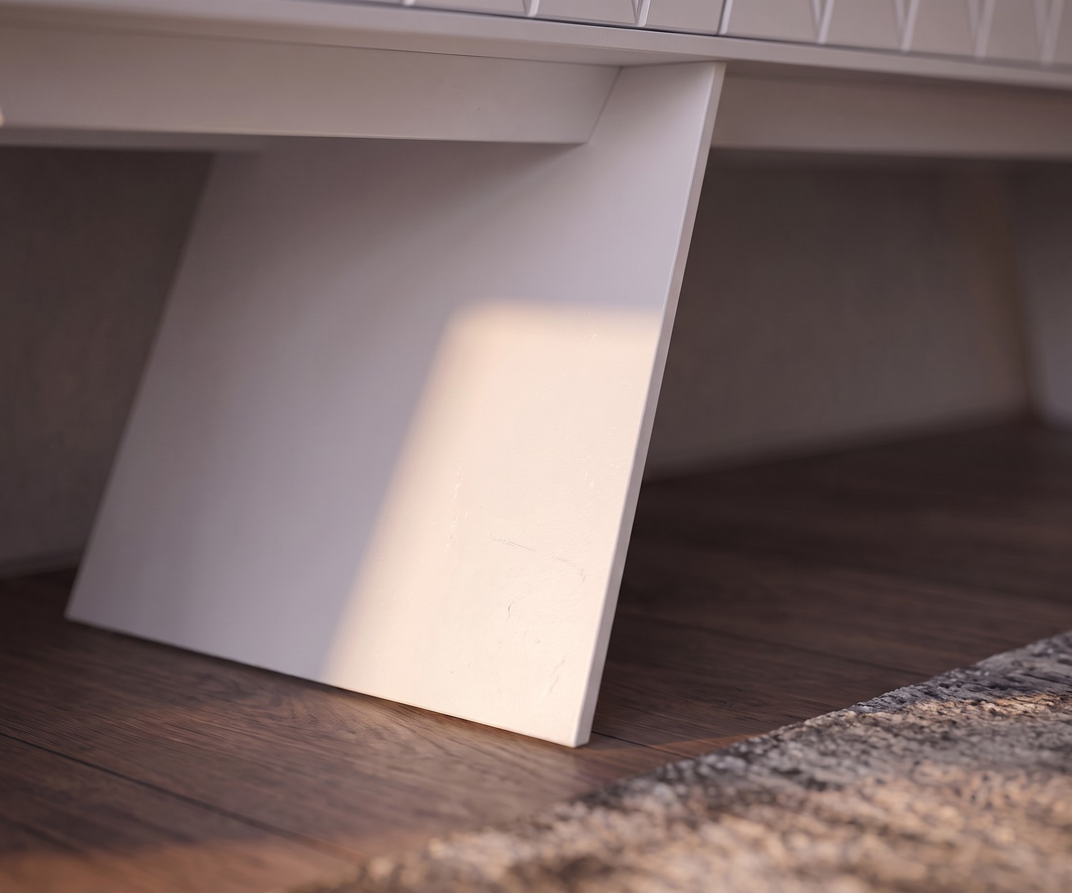 Fuß-Detail des al2 e-klipse 008 Lowboards Fuß des Designer Lowboards e-klipse 008 von al2, detailreiche Nahaufnahme der eleganten weißen Standfüße aus Holz.