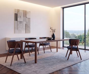 al2 ka-bera 001 b dining table in a modern dining room. Elegant dark wood table with matching stylish chairs.