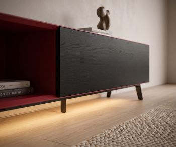 Livitalia Minimal lowboard with LED underglow lighting, red open shelf, and dark oak front in a modern living room.