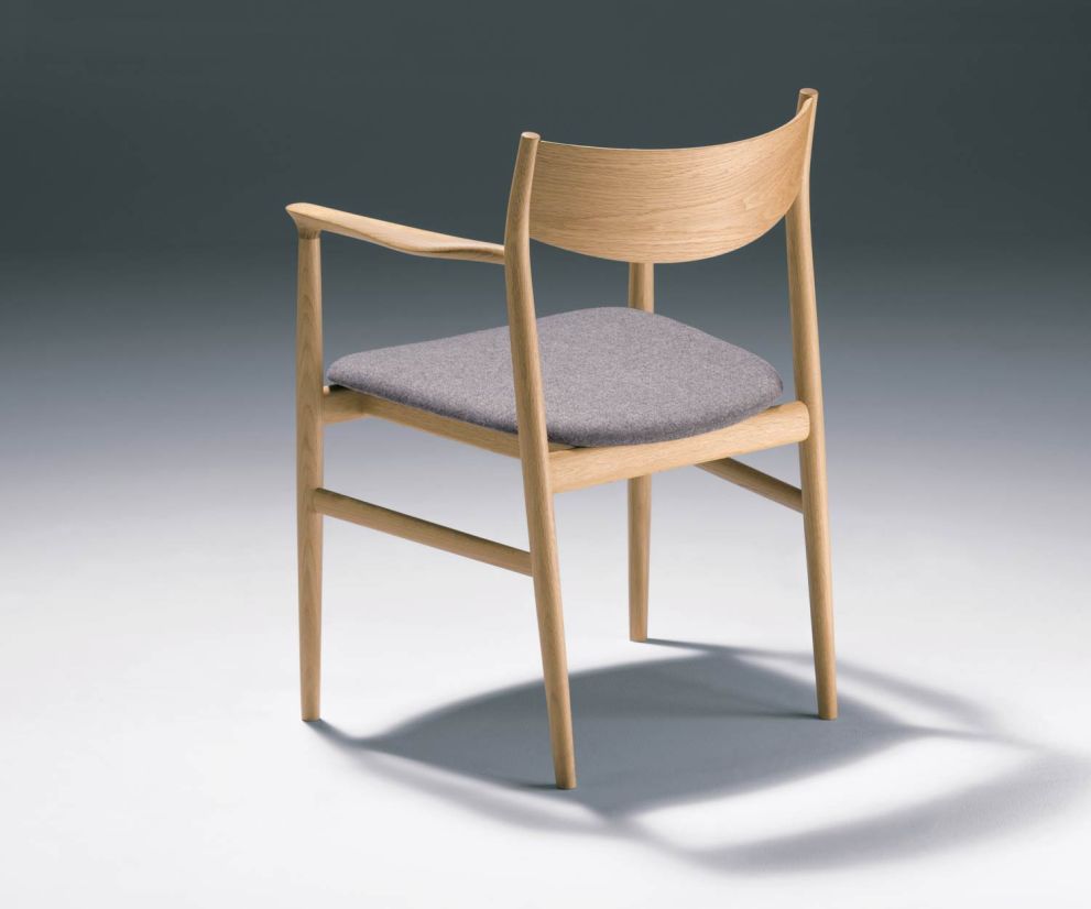 Conde House Kamuy Design armchair in solid oak backrest