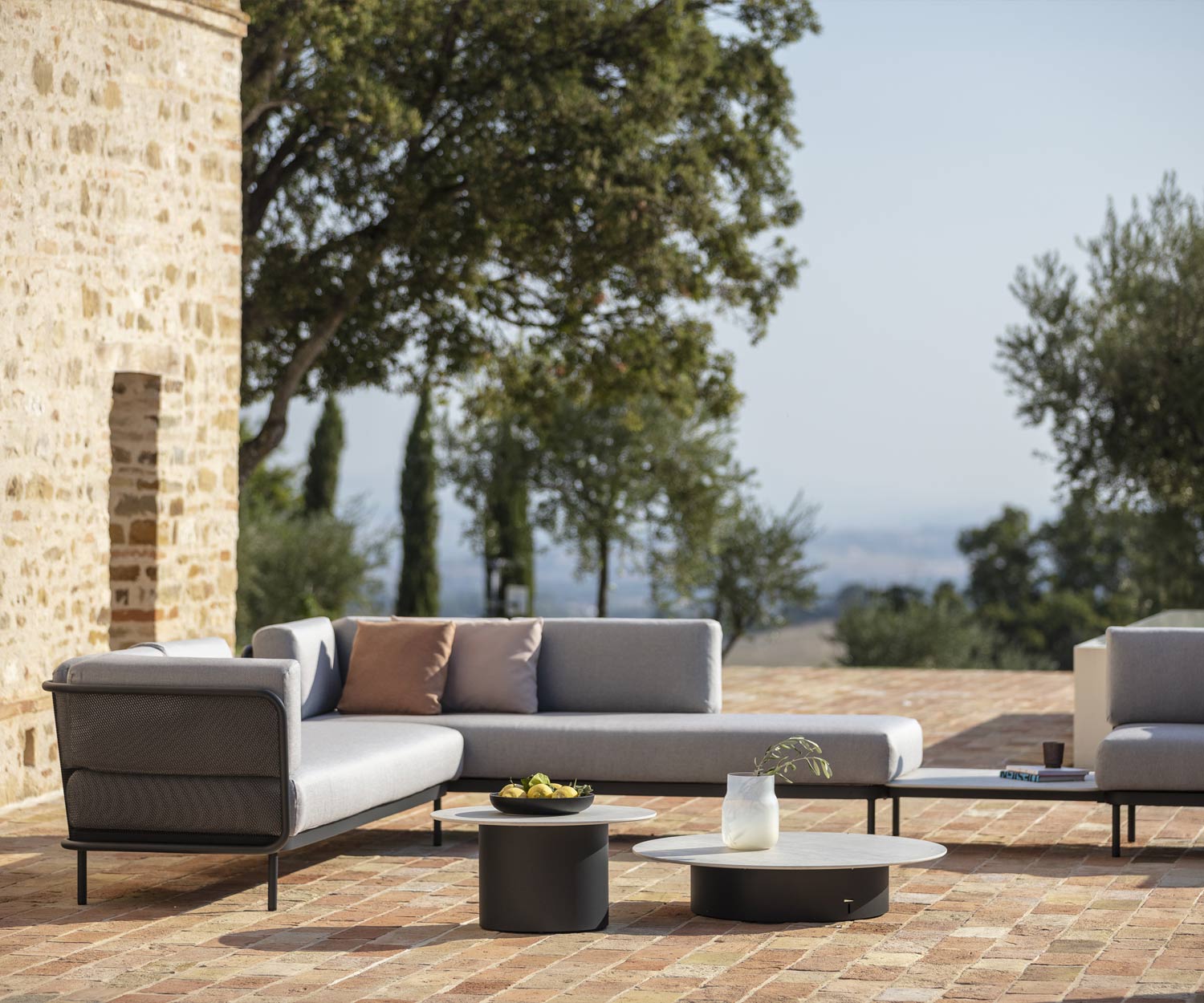 Designer garden sofa Baza from Todus on a terrace in Mediterranean climes