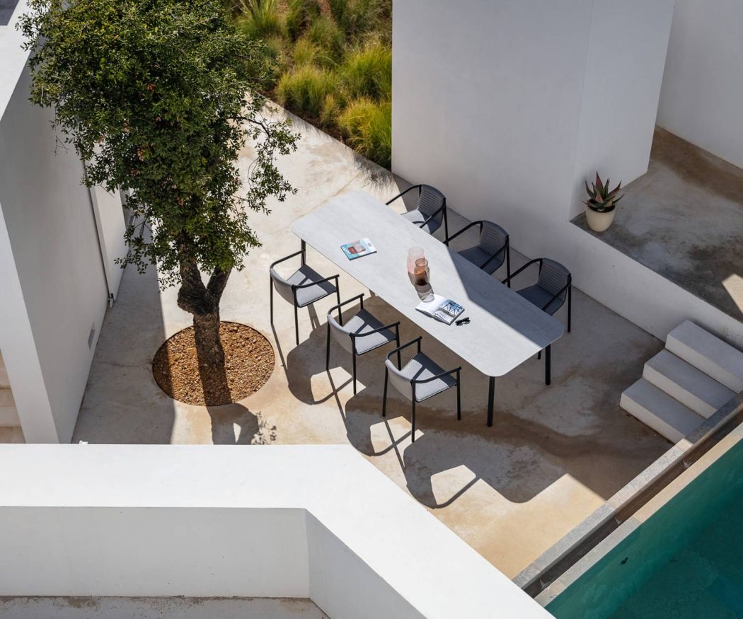 Starling designer garden table for up to six people on a terrace