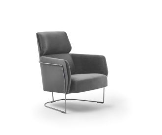 Comfortable Nest living room armchair from Marelli Narrow metal base frame