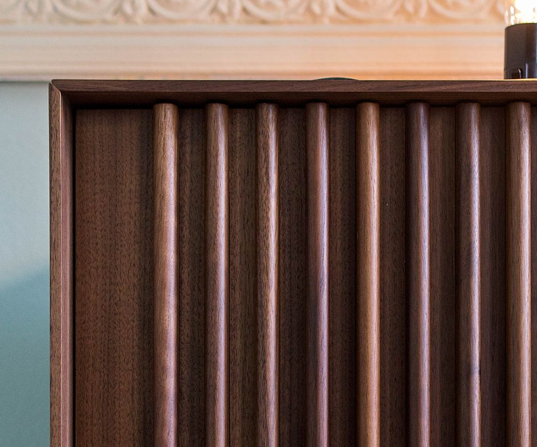 Modern design sideboard detail slatted front in walnut veneer