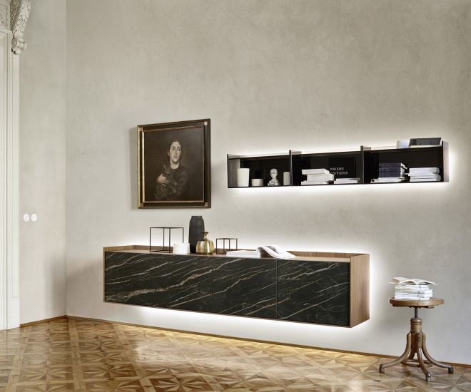 Exclusive Livitalia design glass wall shelf in the living room above a hanging sideboard