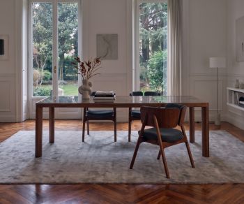 al2 ka-bera 001 b wooden dining table in a modern dining room with matching chairs, grey rug and parquet floor