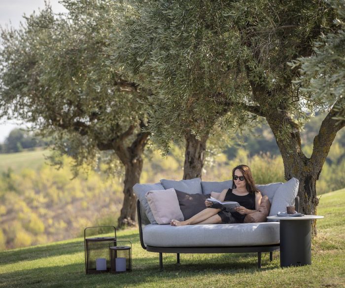 Shady spot with Todus Baza Round Designer Daybed under trees
