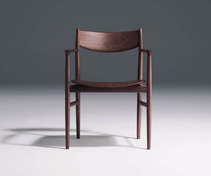 High-quality Conde House Kamuy designer armchair in solid walnut wood